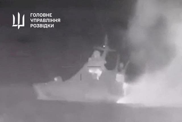 <p>Smoke rising from the patrol ship Sergey Kotov in Ukrainian footage </p>