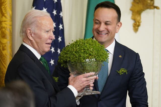 Taoiseach Leo Varadkar presents US President Joe Biden with a bowl of Shamrock last year (Niall Carson/PA)