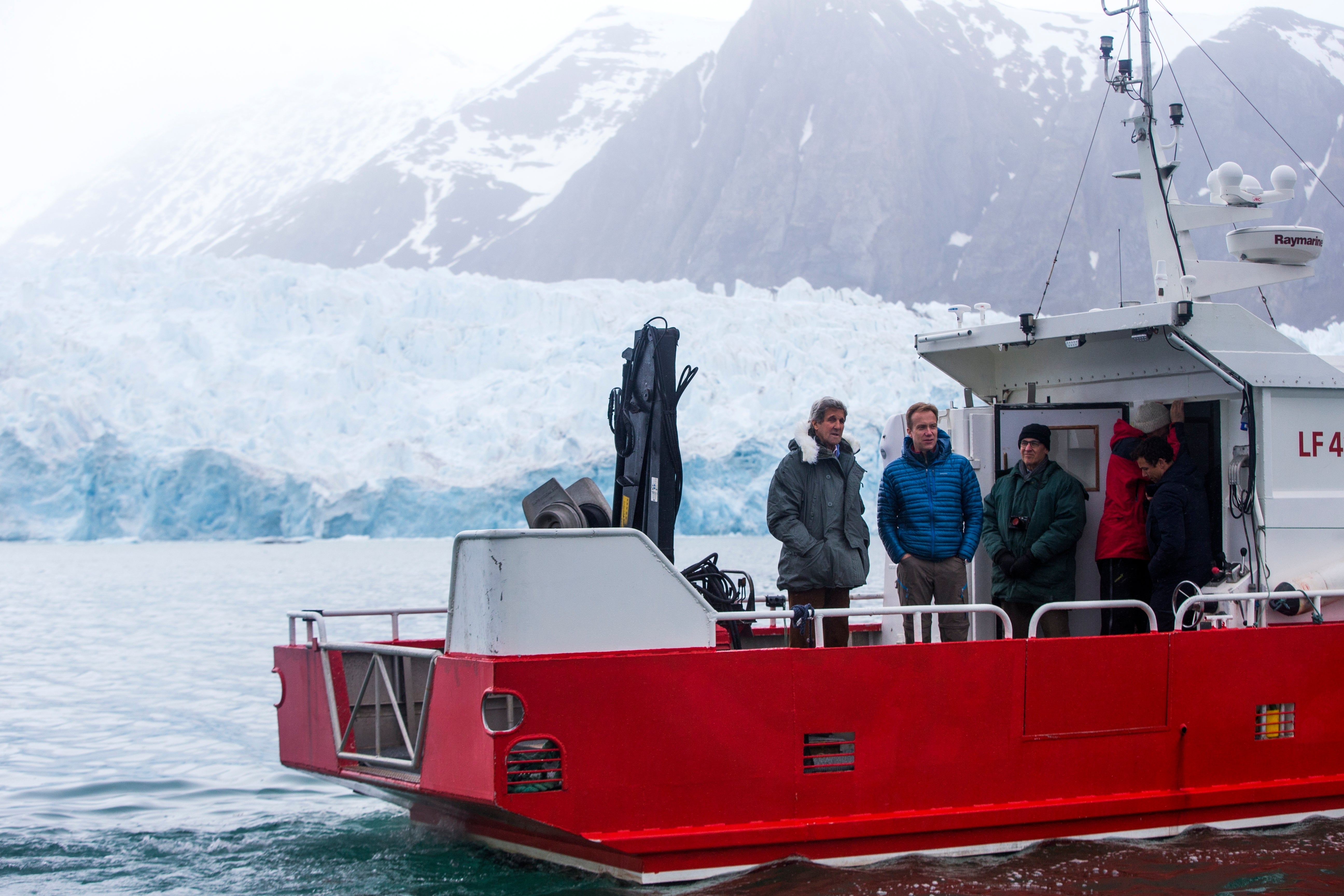 U.S. Secretary of State John Kerry and Norwegian Foreign Minister Borge Brende tour the Blomstrand Glacier, June 16, 2016, in Ny-Alesund, Norway. Kerry visited to view areas impacted by climate change with melting ice and the opening of new sea lanes