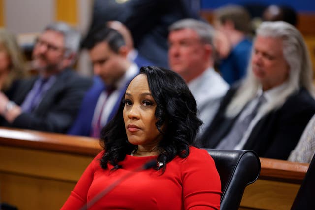 <p>Fulton County District Attorney Fani Willis looks on during a hearing on the Georgia election interference case, 1 March 2024, in Atlanta</p>
