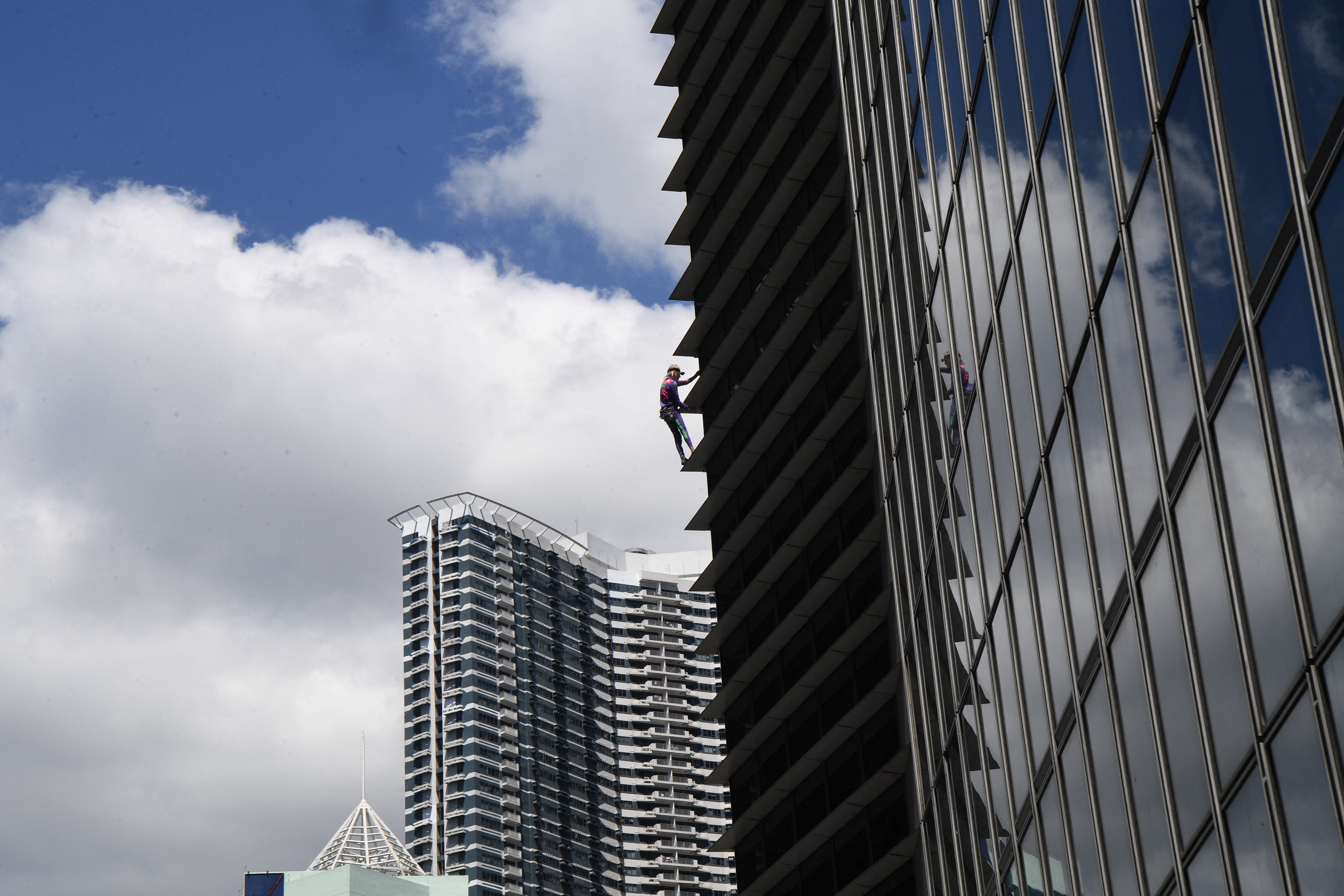 Alain Robert previously climed the same building in Manila in 2019