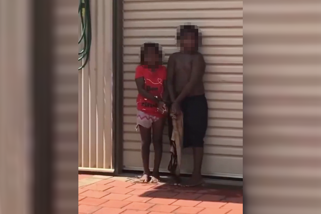 <p>A screengrab from the viral video shows two aboriginal kids restrained in Broome, western Australia </p>