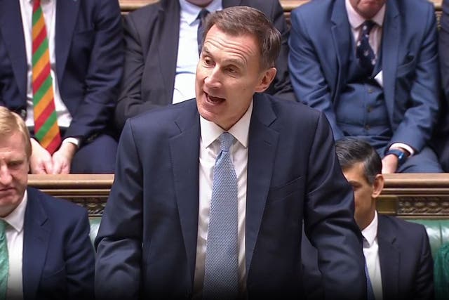 <p>Jeremy Hunt delivering his Budget to the Commons (House of Commons/UK Parliament/PA)</p>