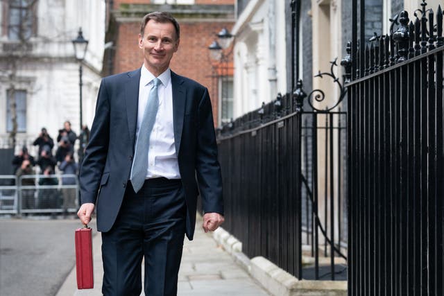 <p>Jeremy Hunt has attempted to shore up support for his languishing party with a series of tax cuts – but the budget watchdog has warned the typical worker will still be hundreds of pounds worse off overall</p>