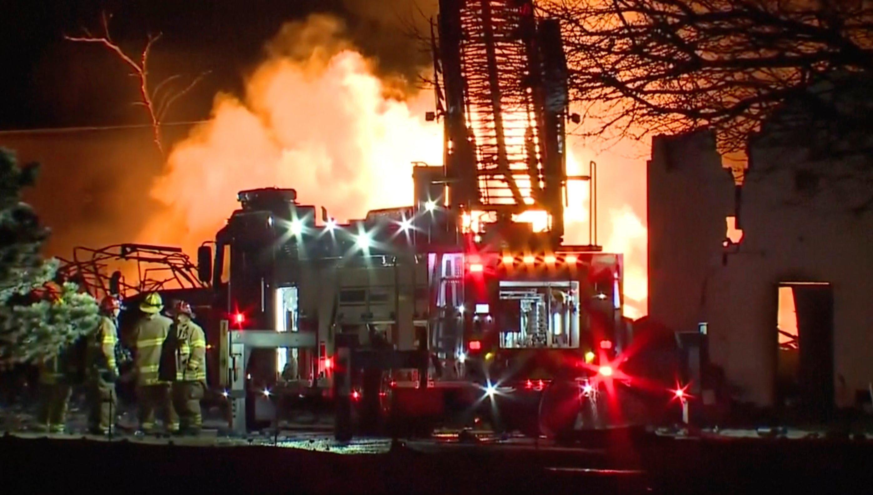 Firefighters battle an industrial fire in the Detroit suburb of Clinton Township