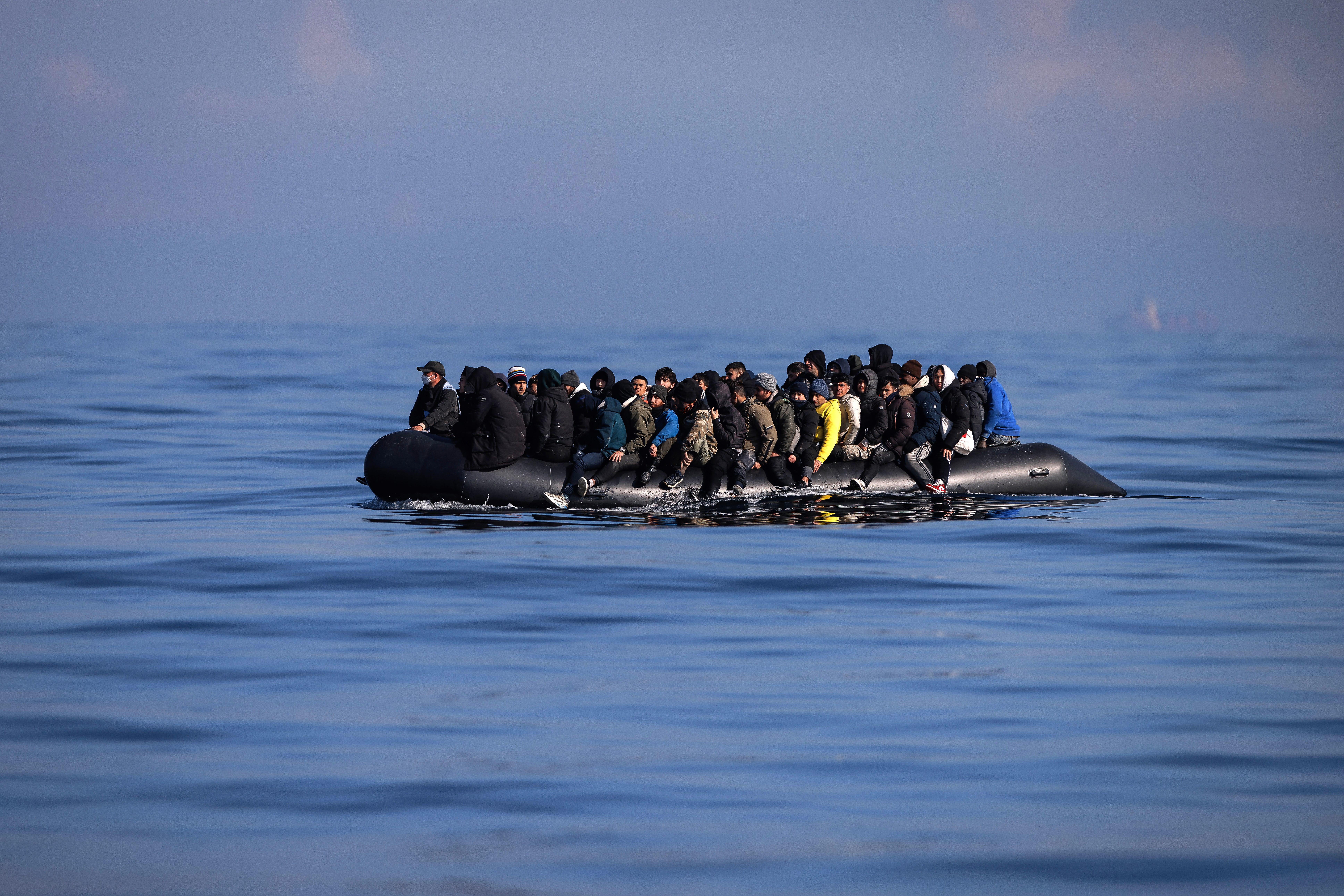 An inflatable dinghy carrying around 65 migrants crosses the English Channel on 6 March 2024