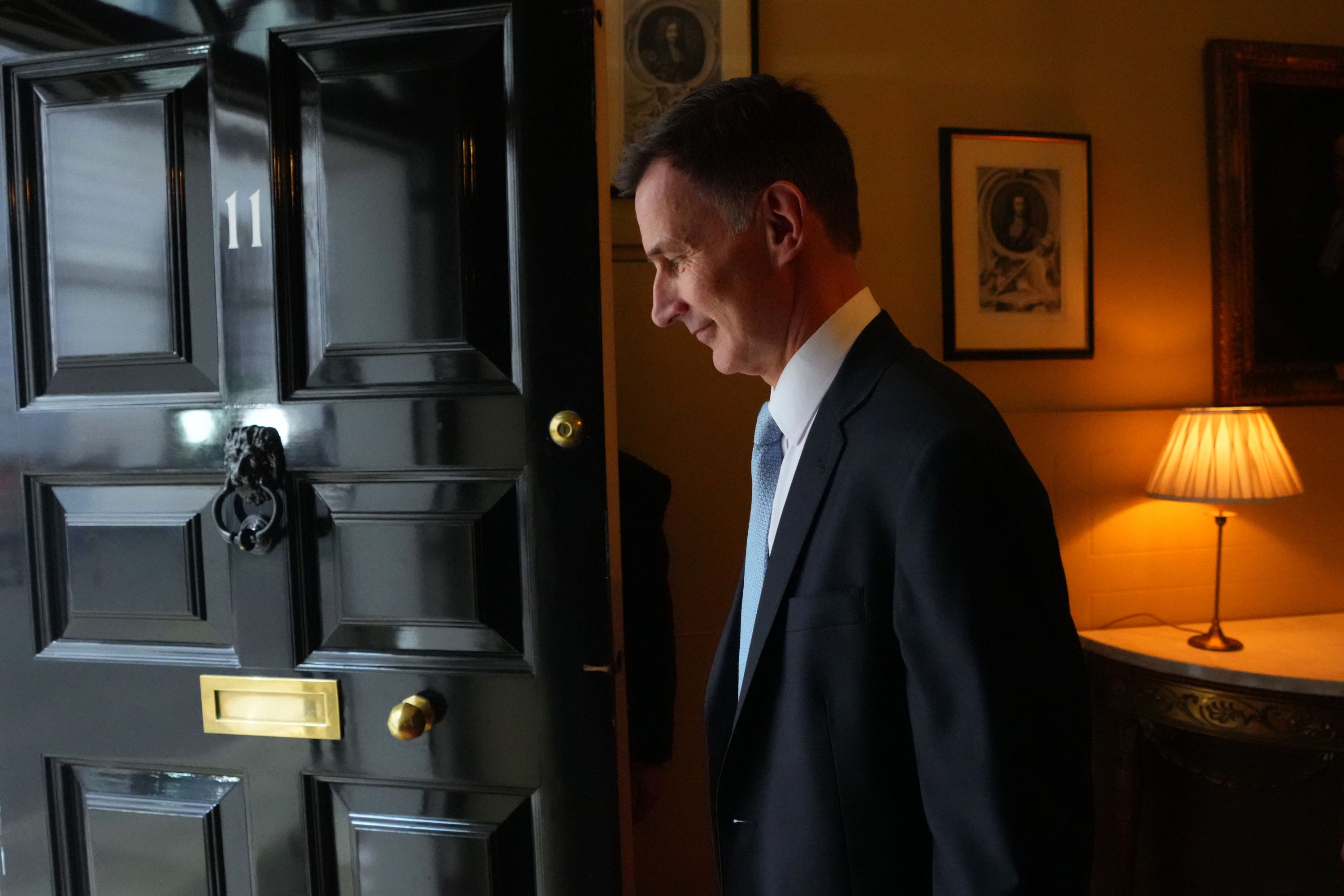 Chancellor of the Exchequer Jeremy Hunt exits 11 Downing Street ahead of delivering his Budget (Carl Court/PA)