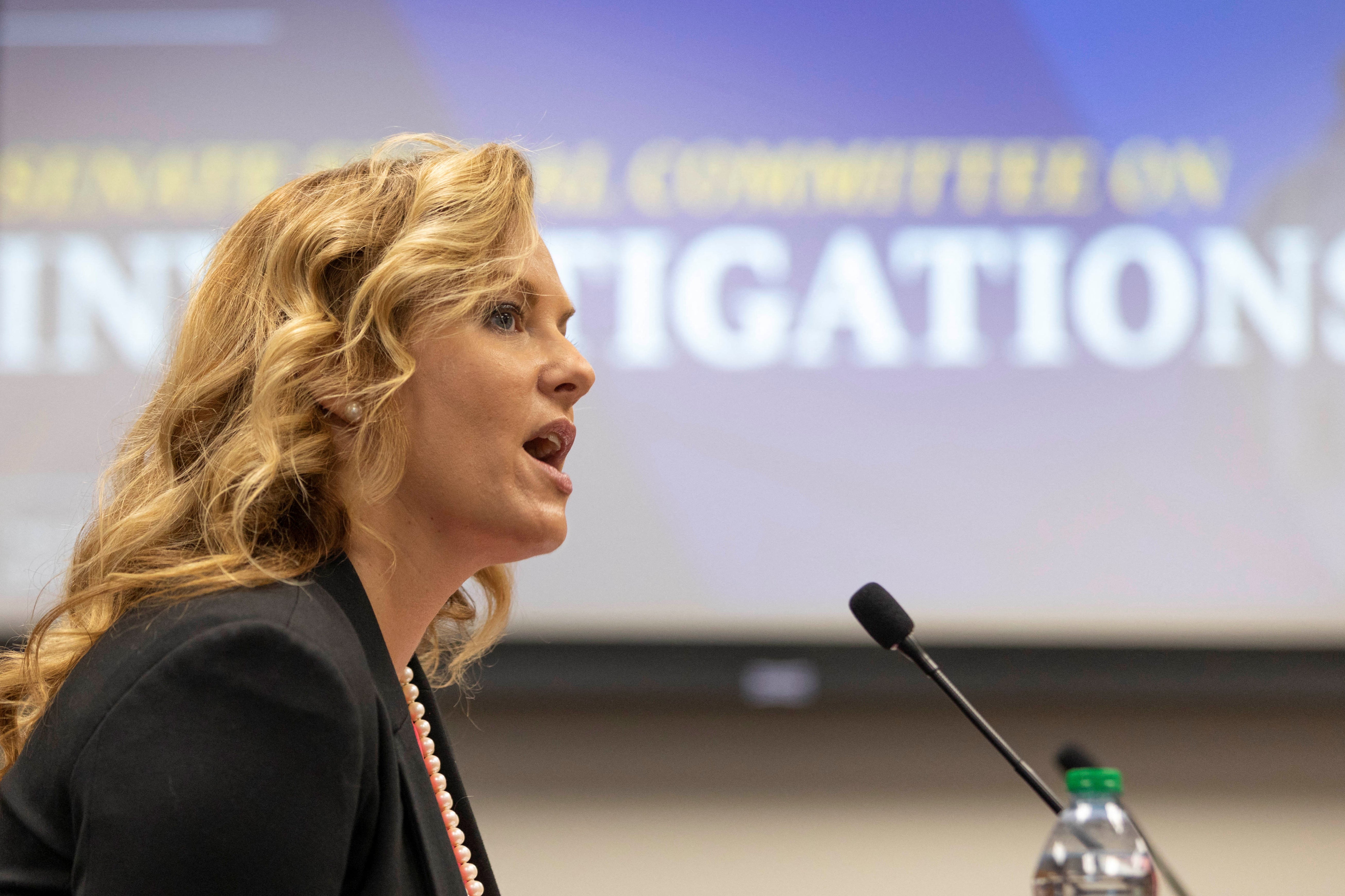 Attorney Ashleigh Merchant testifies in front of members of the Georgia State Senate during a Special Committee on Investigations meeting to discuss how Fulton County District Attorney Fani Willis