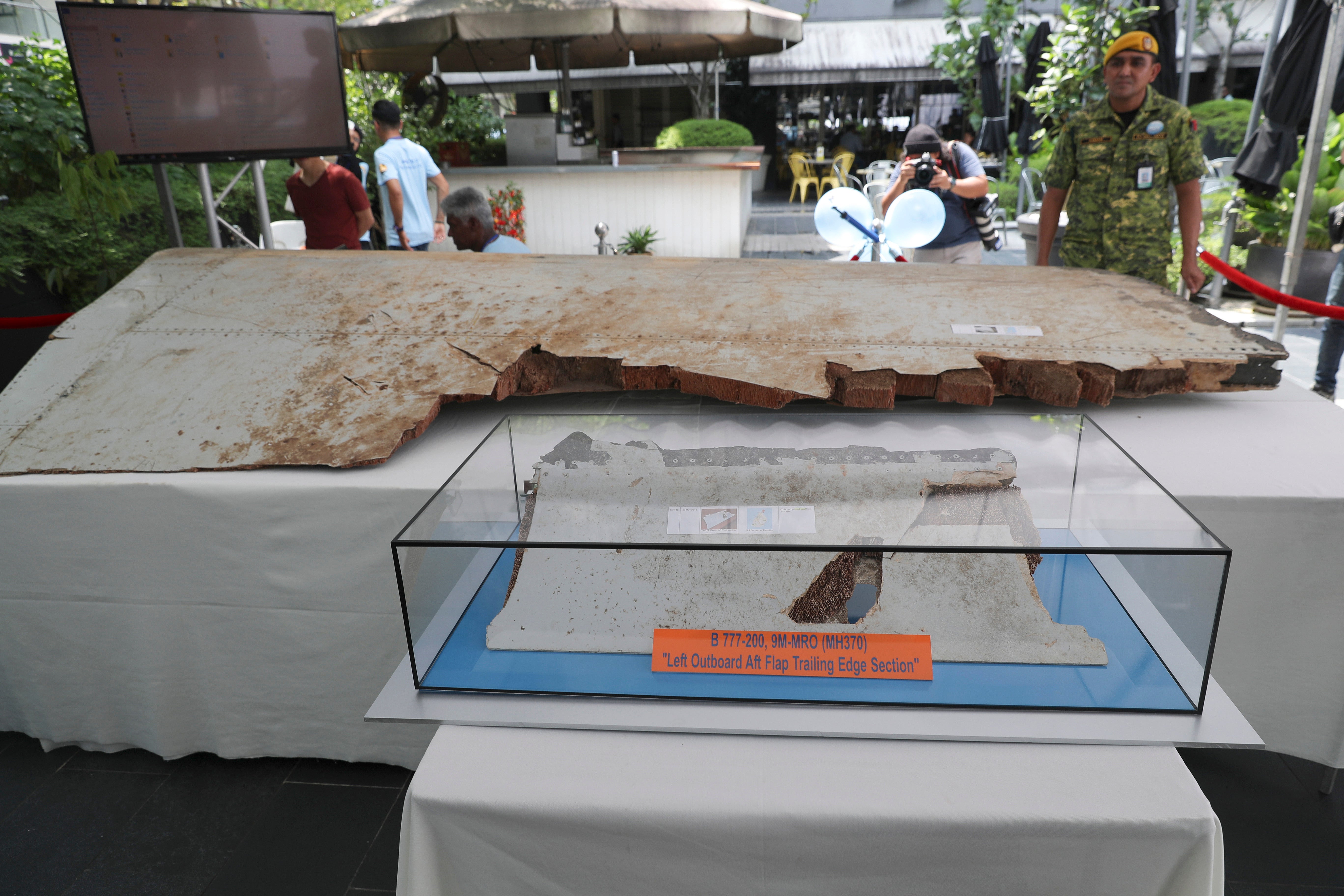 Debris from the missing Malaysia Airlines Flight MH370 is displayed during a Day of Remembrance for MH370 event in Kuala Lumpur, Malaysia