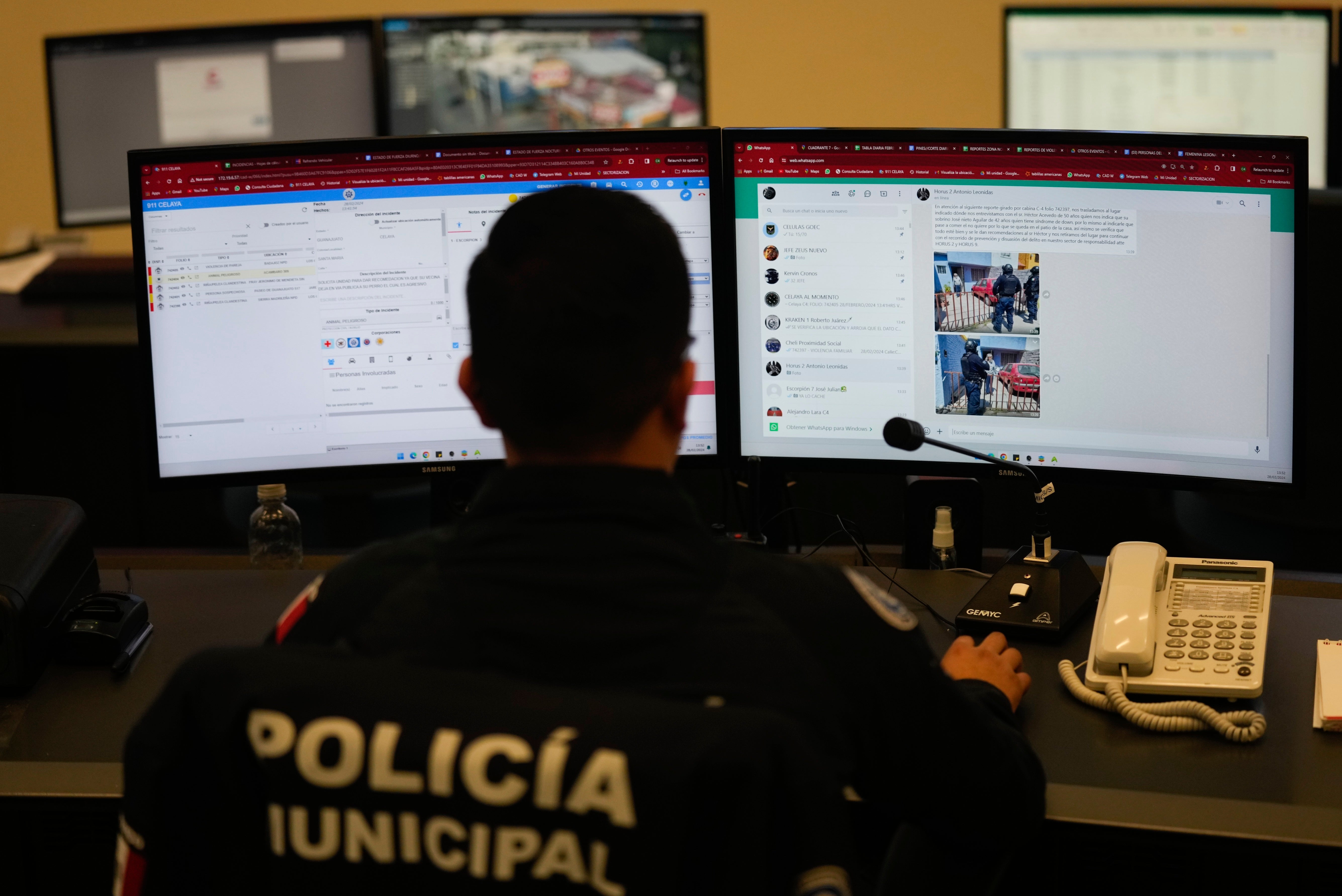 A municipal police officer monitors social media sites at a police control and monitoring center, in Celaya, Mexico
