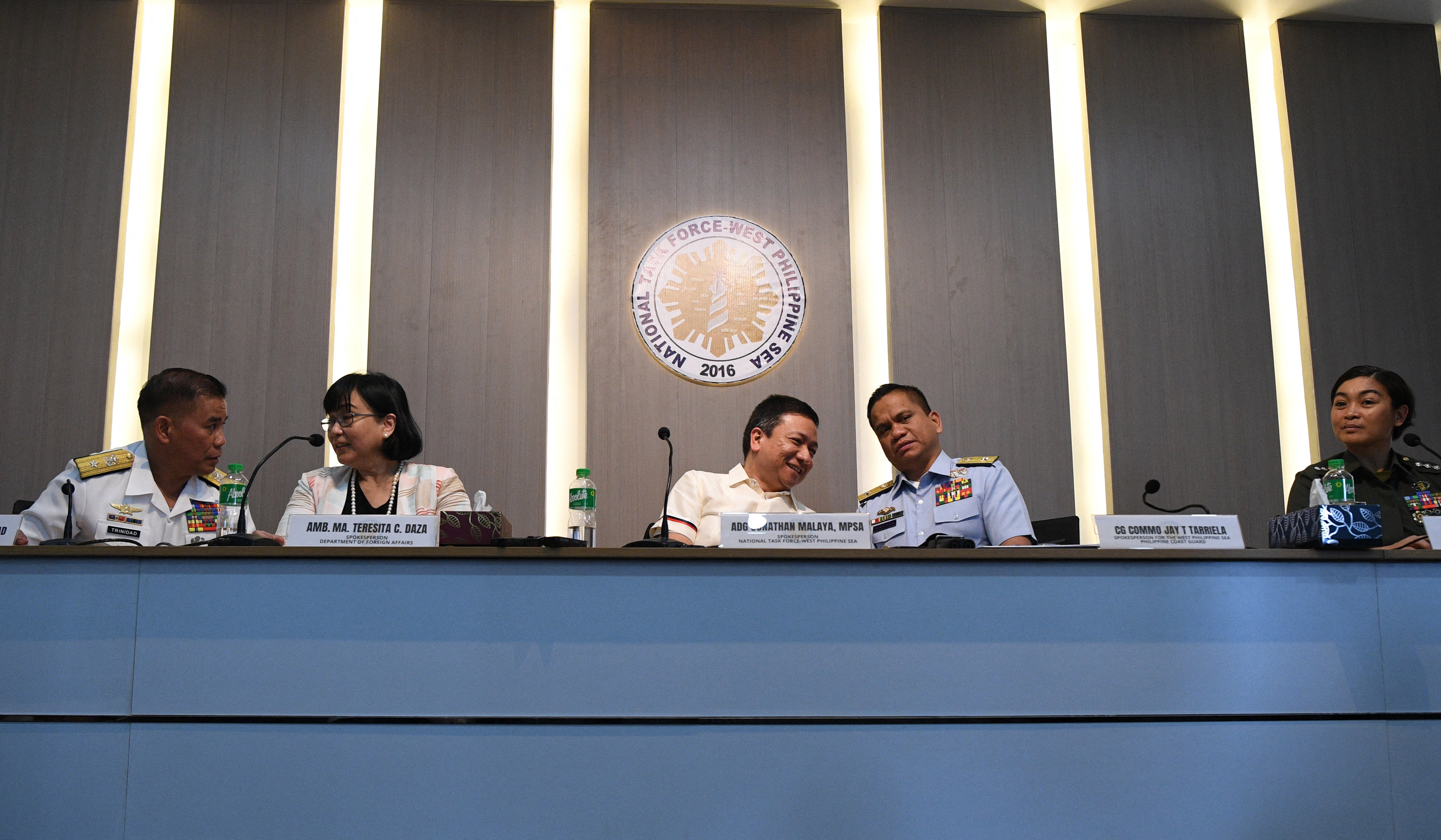 (L-R) Commodore Roy Trinidad,Philippine Navy spokesperson for the West Philippine Sea, Ambassador Teresita Daza, spokesperson of the Philippine Department of Foreign Affairs, Philippine National security Council Assistant Director General Jonathan Malaya, Philippine Commodore Jay Tarriela, Coast Guard spokesperson for the West Philippine Sea, and Colonel Francel Padilla, spokesperson for the Philippine Military, attend a joint press conference in Manila on March 6, 2024. The Philippines said on March 5 that China Coast Guard vessels caused two collisions with Philippine boats and water cannoned one of them, leaving four crew injured during a resupply mission in the South China Sea