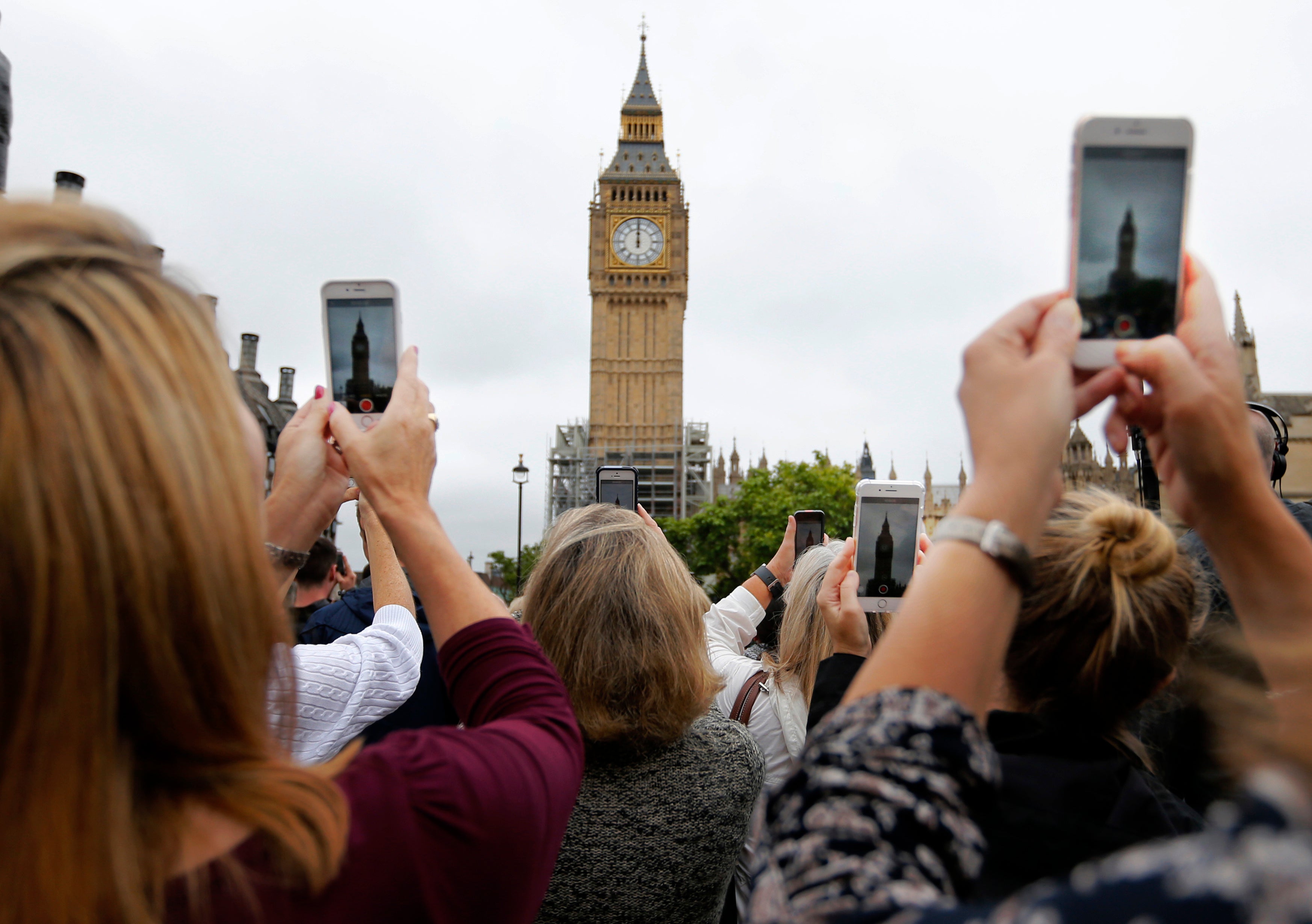 People record the Big Ben clock at Elizabeth Tower in London