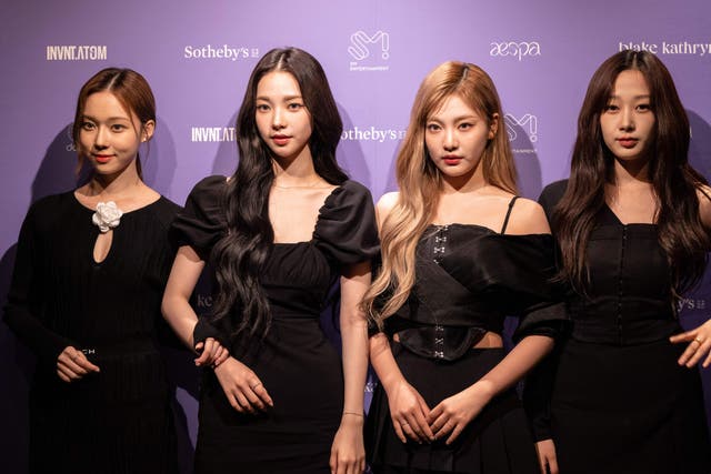 <p>File. Members of K-Pop group Aespa (from L) Winter, Karina, Ningning and Giselle pose during the launch event for their NFT collection at Sotheby’s on 14 October 2022 in New York</p>