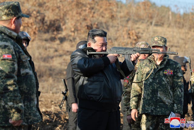<p>A photo released by state media shows North Korea’s Kim Jong-un visiting an undisclosed military base on Wednesday 6 March</p>