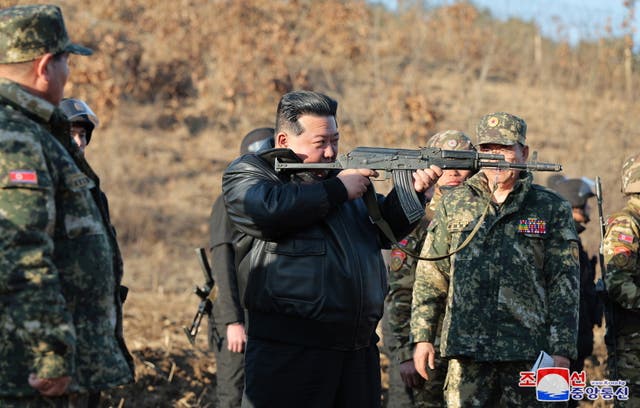 <p>A photo released by state media shows North Korea’s Kim Jong-un visiting an undisclosed military base on Wednesday 6 March</p>