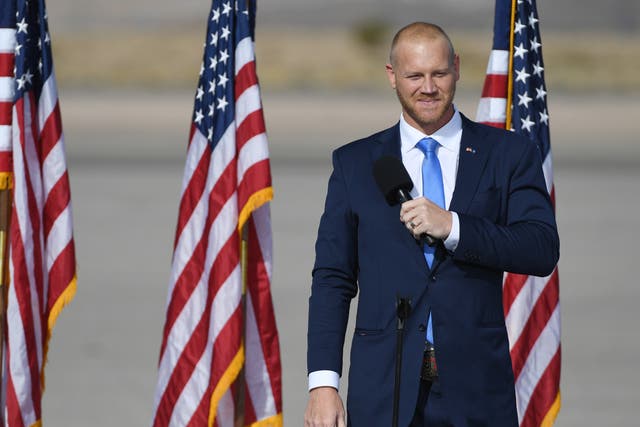 <p>Nevada Republican congressional candidate and former professional wrestler Daniel Rodimer speaks during a rally for Vice President Mike Pence at the Boulder City Airport on October 8, 2020 in Boulder City, Nevada</p>