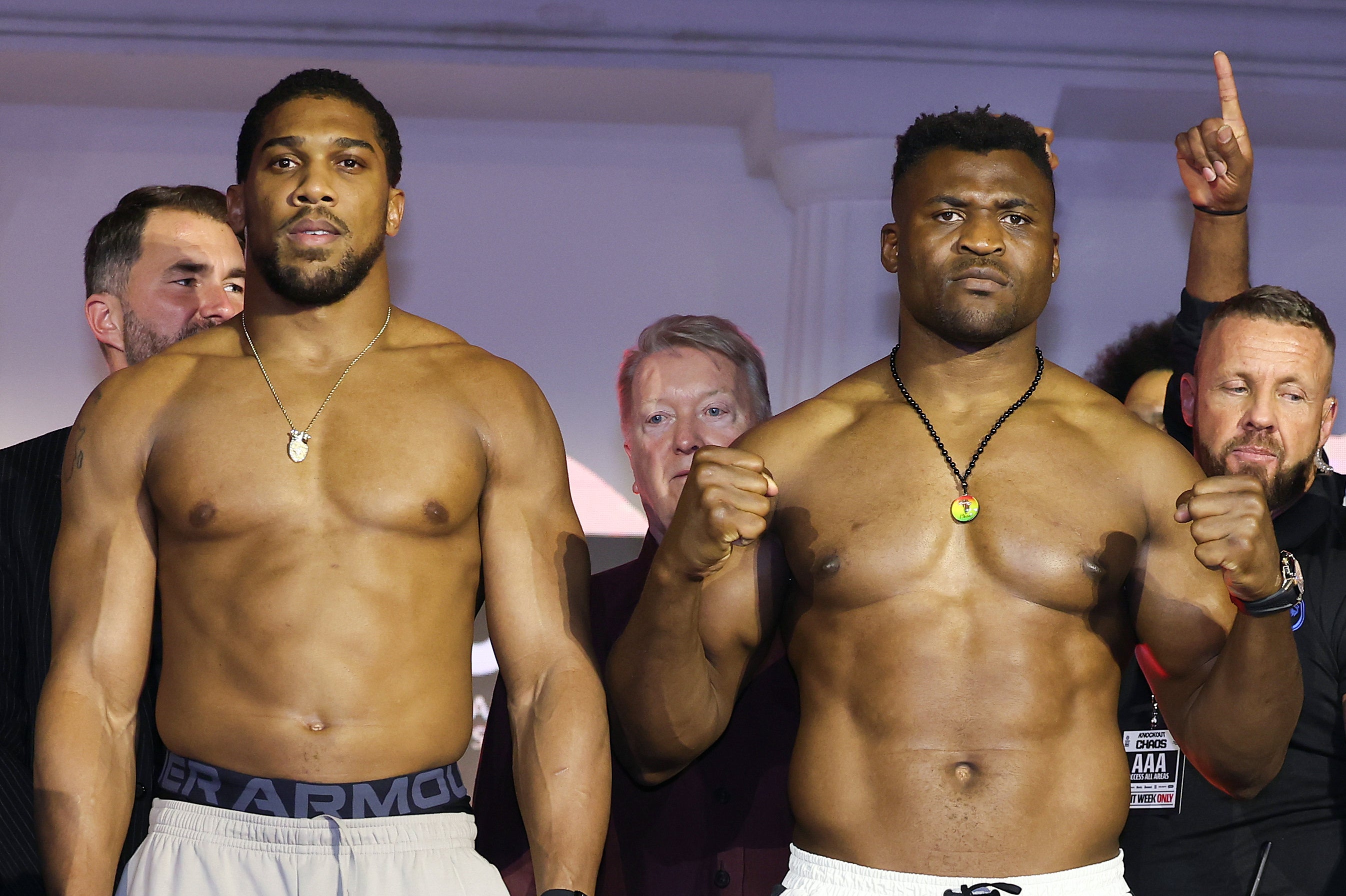 <p>Anthony Joshua (left) and Francis Ngannou after weighing in for their bout</p>