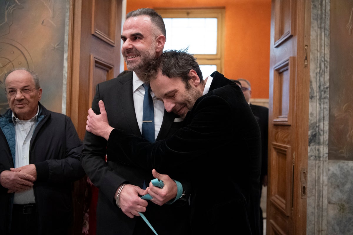 In rights landmark, Greek novelist and lawyer are the first same-sex couple wed at Athens city hall
