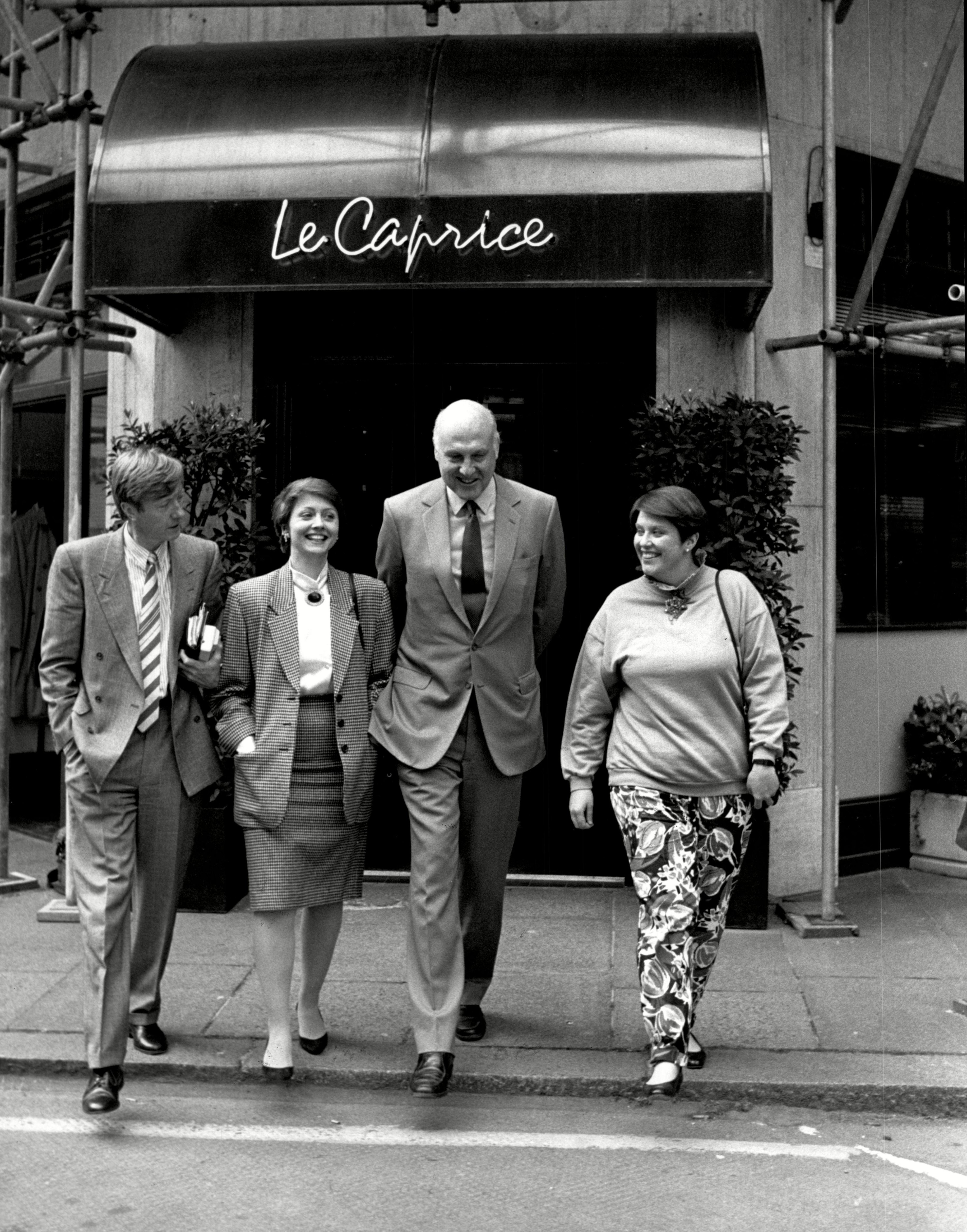 Journalists Anne Diamond (left) and Gordon Honeycombe (centre) outside the eatery