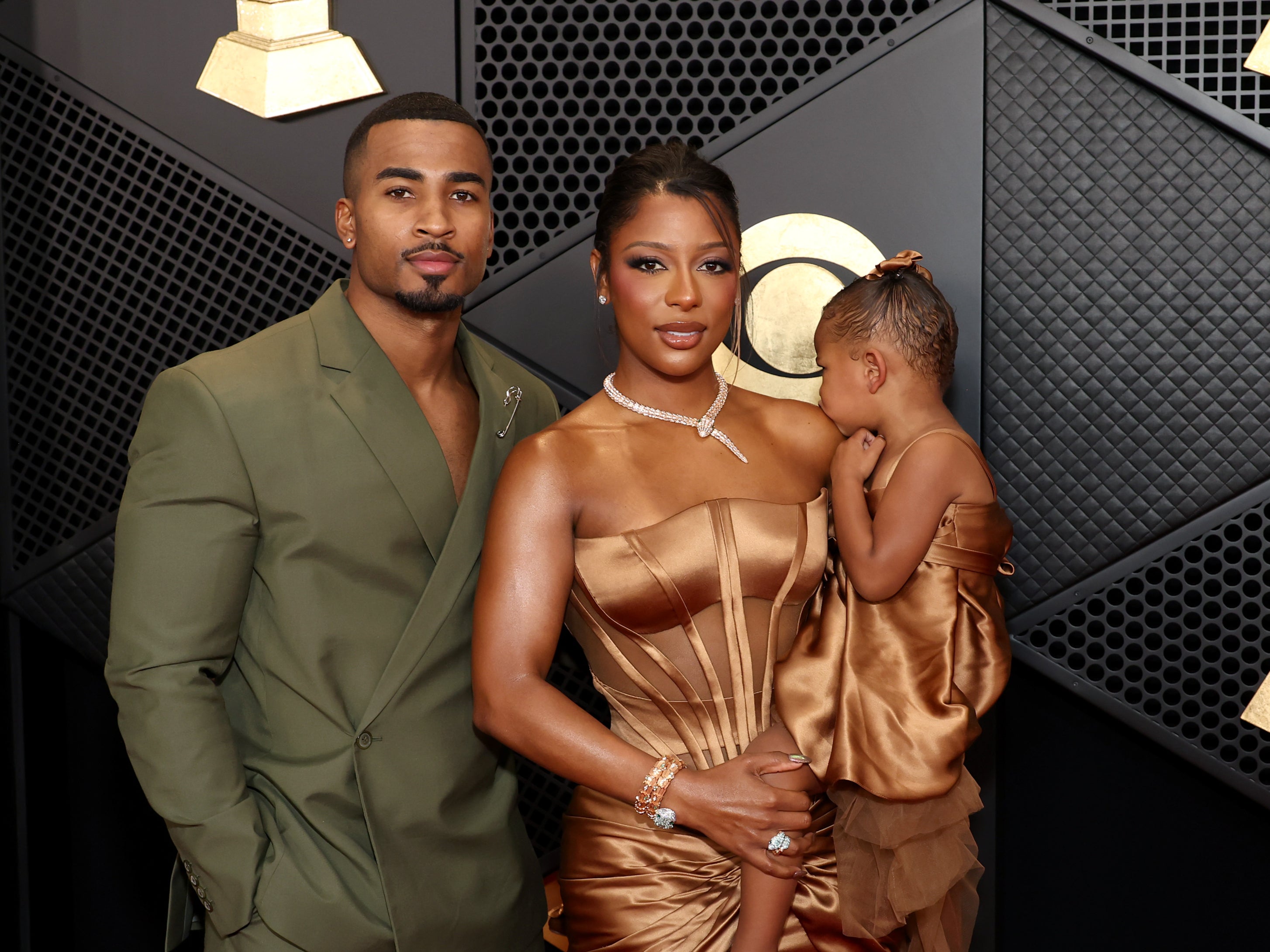 <p>John Gaines, Victoria Monét and Hazel Monét attend the 66th GRAMMY Awards at Crypto.com Arena on 4 February 2024 in Los Angeles, California. </p>