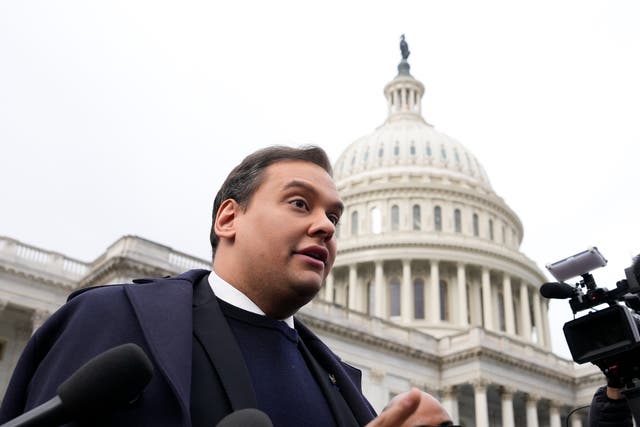 <p>Rep George Santos (R-NY) is surrounded by journalists as he leaves the U.S. Capitol after his fellow members of Congress voted to expel him from the House of Representatives on December 01, 2023 in Washington, DC</p>