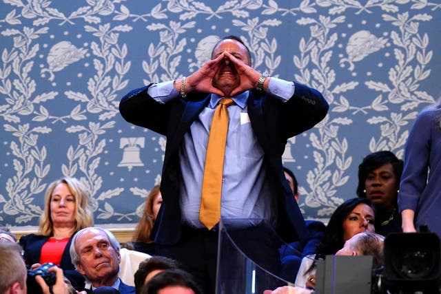 <p>A protestor shouts at US President Joe Biden as he delivers his third State of the Union address in the House Chamber of the US Capitol in Washington, DC</p>