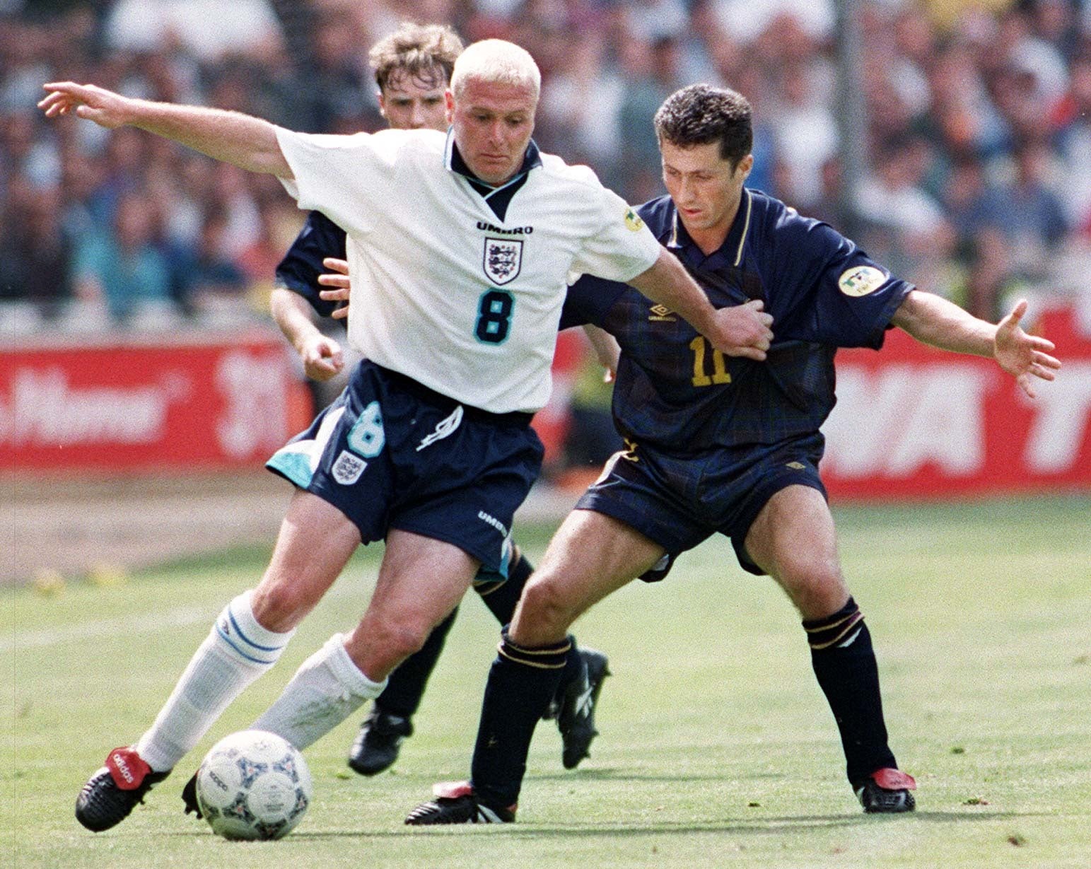Gascoigne holds off Scotland’s John Collins during the Euro 96 clash at Wembley