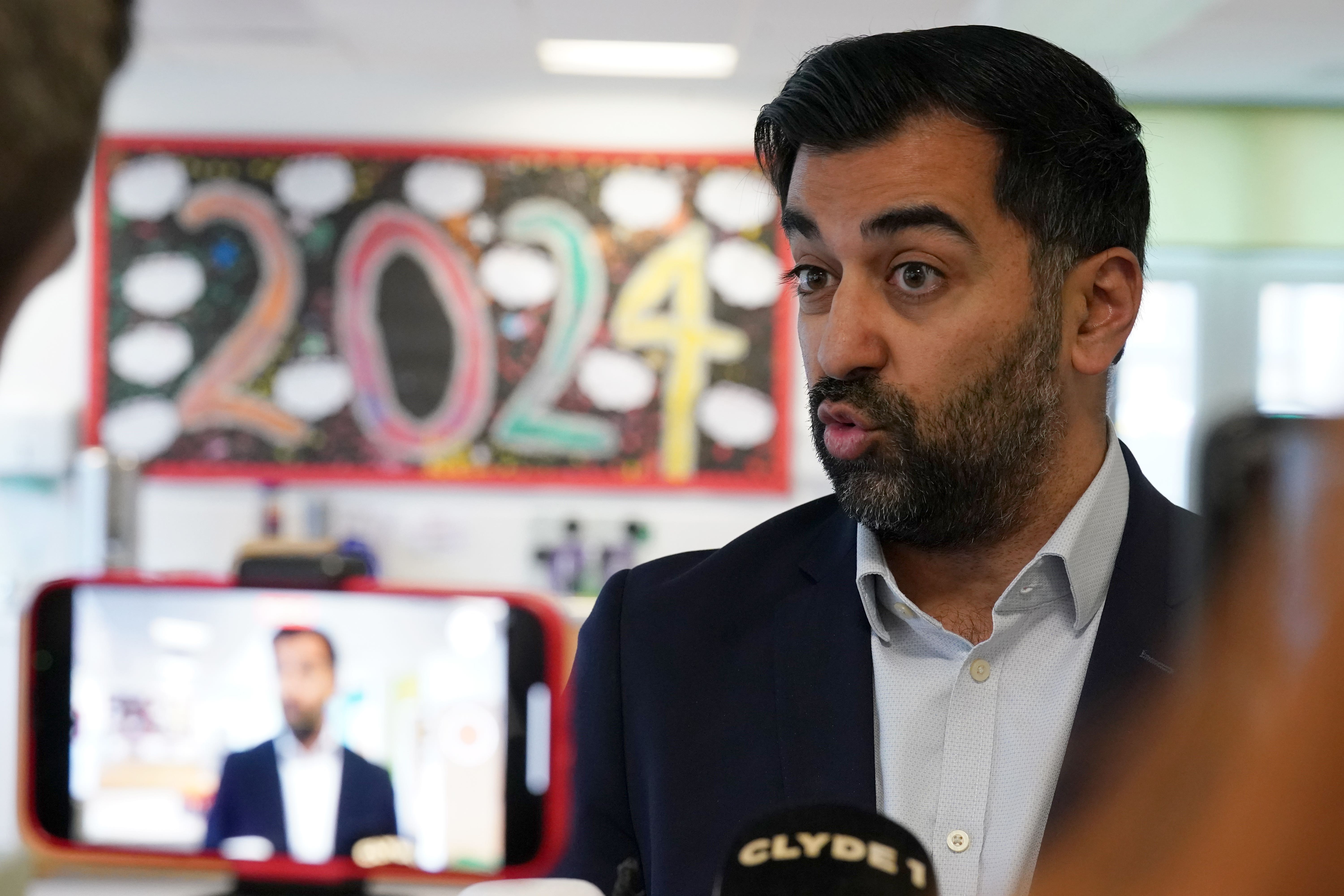 First Minister Humza Yousaf has hit out at Scottish Tories over the windfall tax extension (Andrew Milligan/PA)