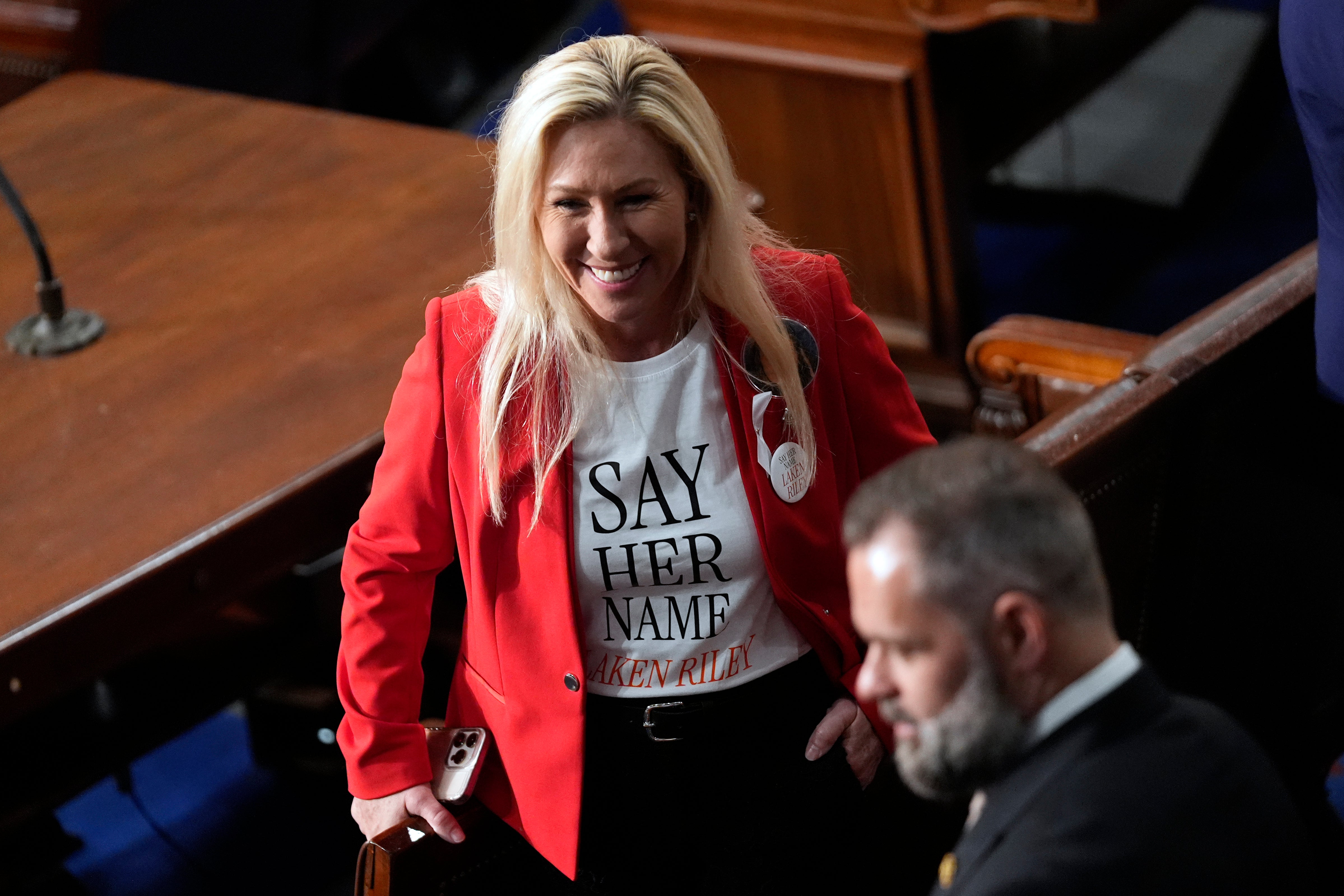 Congresswoman Marjorie Taylor Greene, in a shirt referencing the murder of Laken Riley, during the State of the Union Address