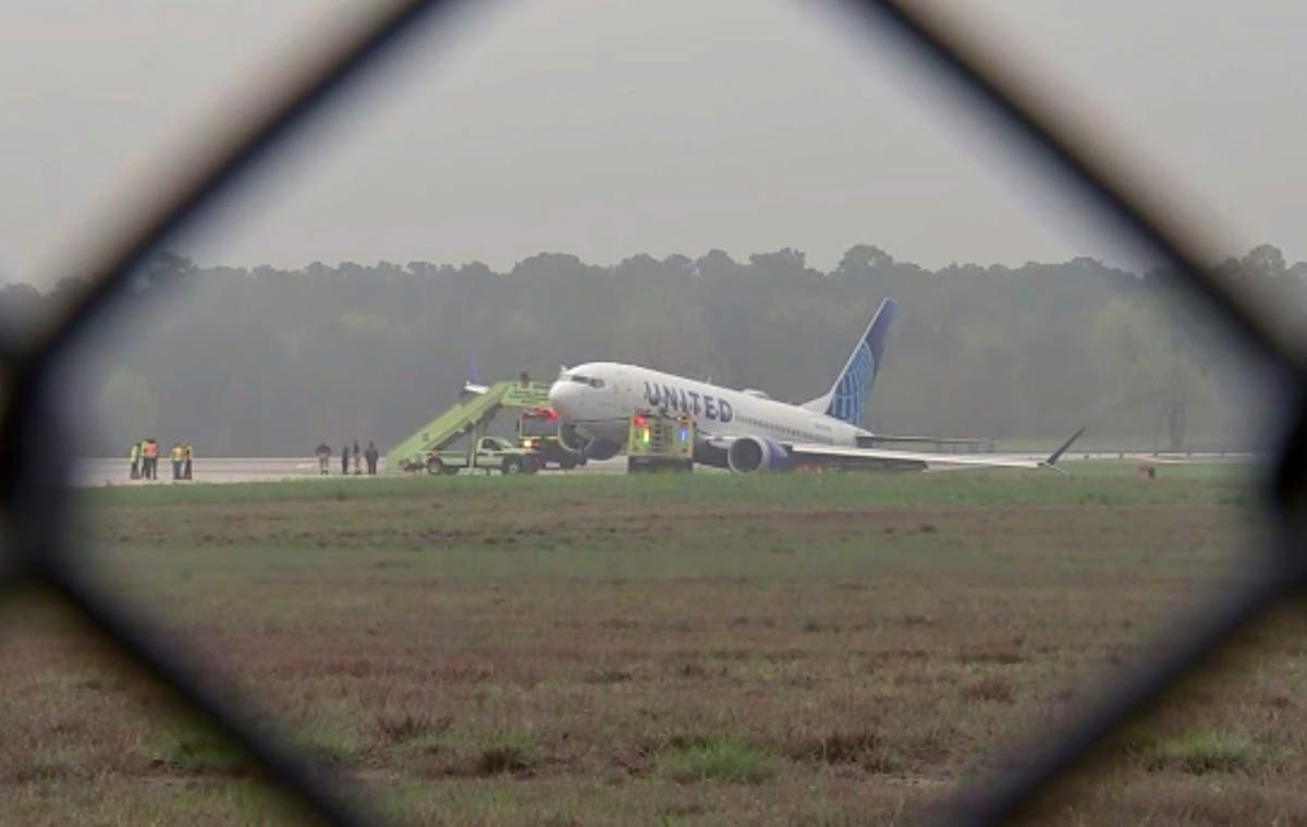 United Airlines plane rolls off runway in Houston