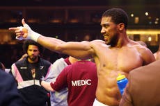 Anthony Joshua sends message to Tyson Fury with apparent gun gesture after Francis Ngannou KO
