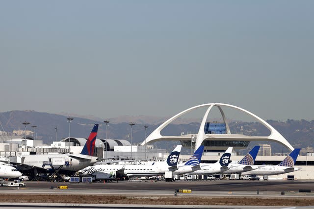 <p> Airplanes sit on the tarmac at Los Angeles International Airport</p>