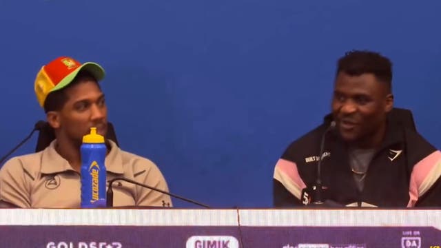 <p>AJ and Ngannou during the post-match press conference</p>