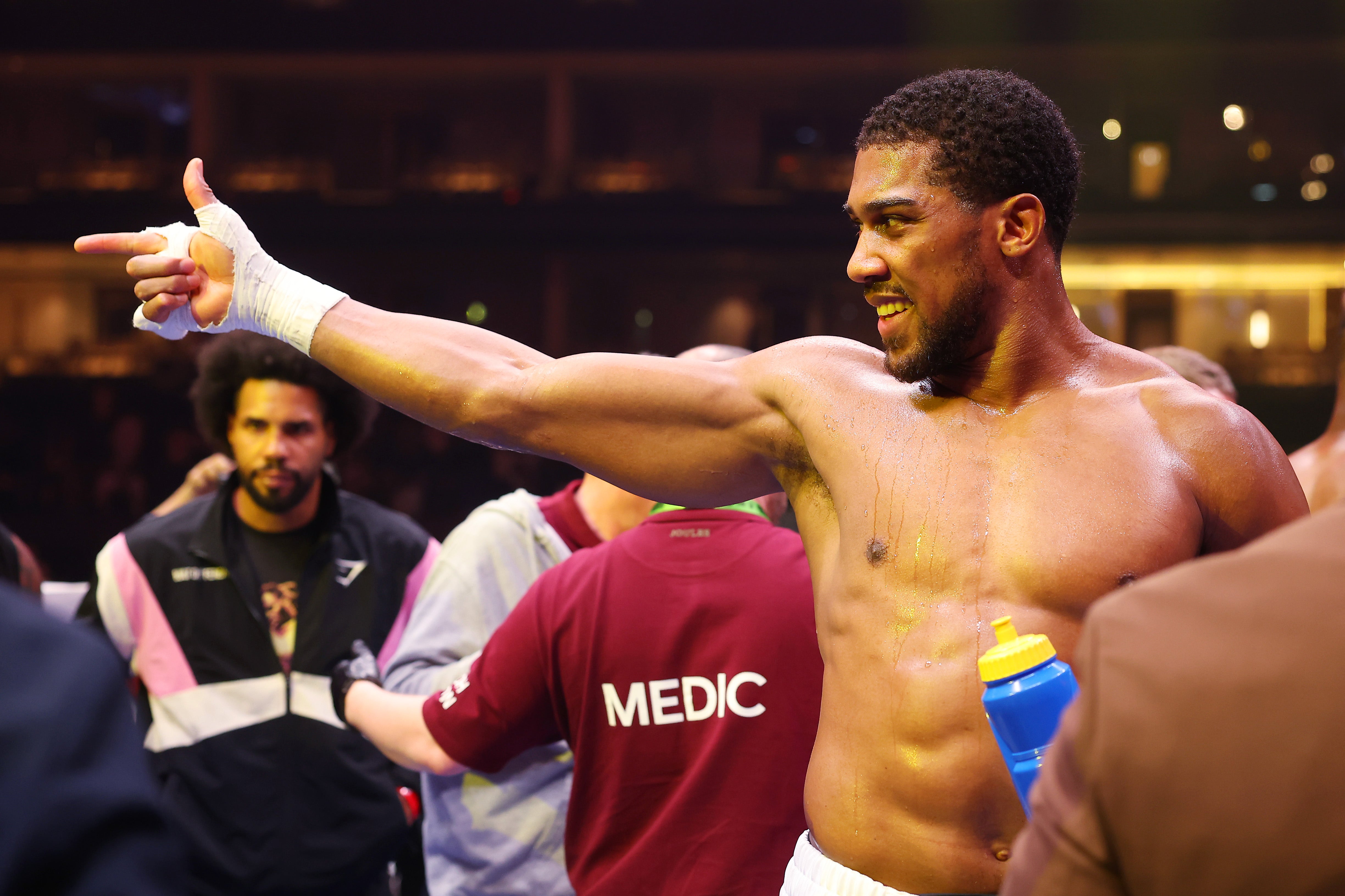 Anthony Joshua gestures towards Tyson Fury following the fight