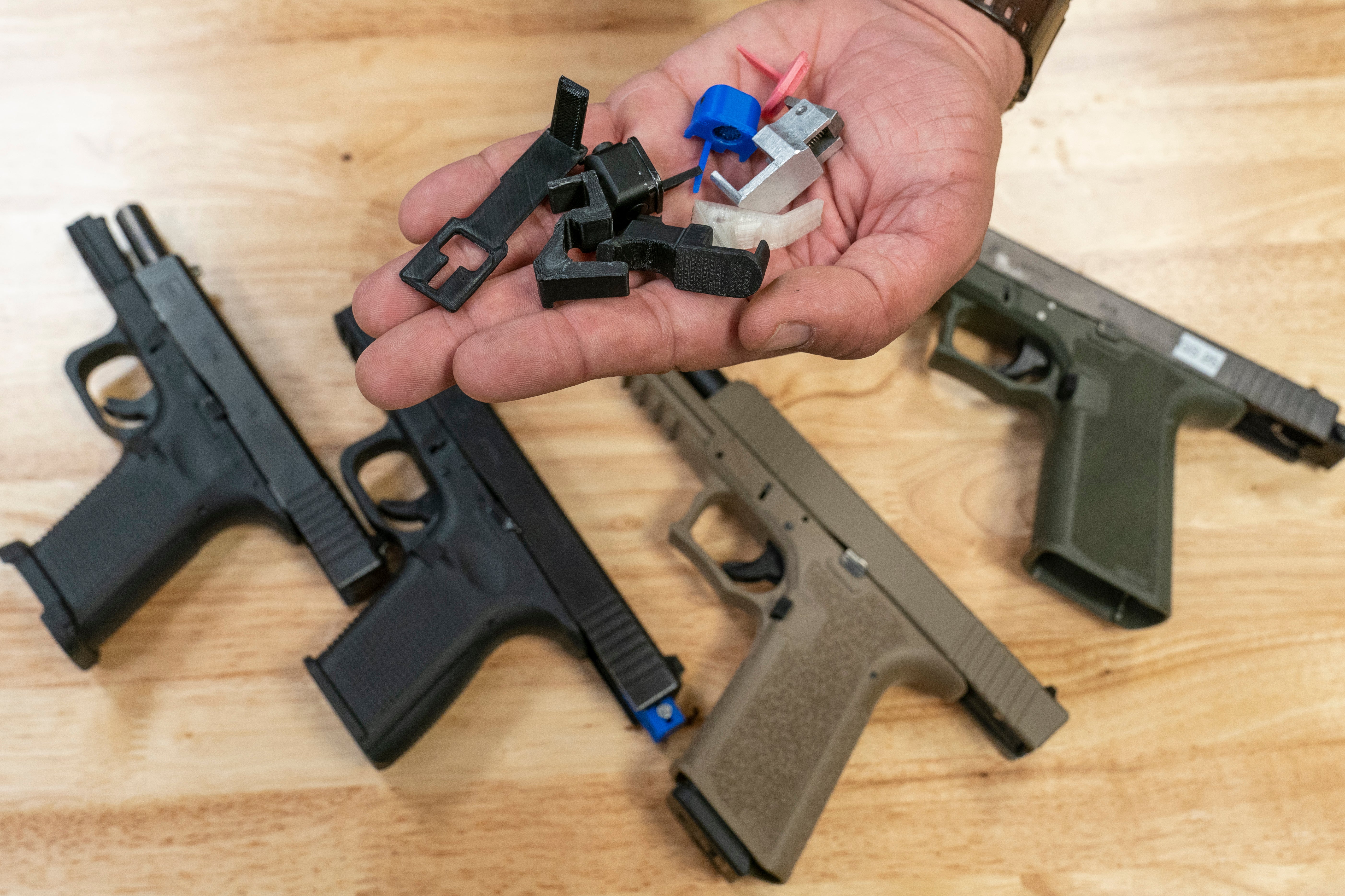 A handful of fully automatic conversion devices is displayed for a photograph