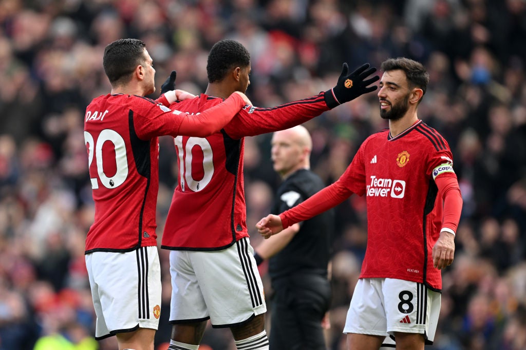 Rashford celebrates after Fernandes handed him United’s second penalty