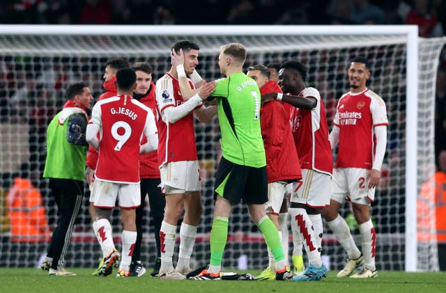 <p>Kai Havertz and Aaron Ramsdale celebrate Arsenal’s 2-1 win over Brentford </p>