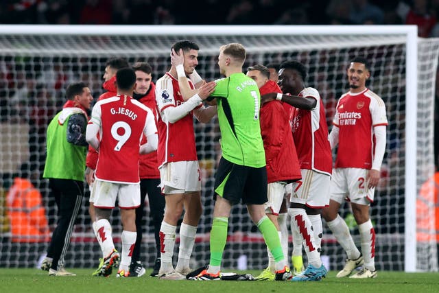 <p>Kai Havertz and Aaron Ramsdale celebrate Arsenal’s 2-1 win over Brentford </p>