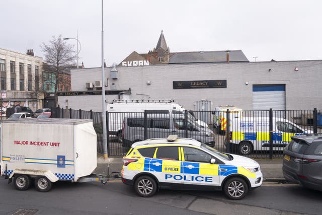<p>Police outside the Hessle Road branch of Legacy Independent Funeral Directors in Hull</p>