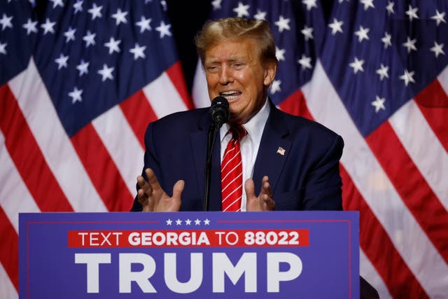 <p>Republican presidential candidate and former US President Donald Trump addresses a campaign rally at the Forum River Center March 09, 2024 in Rome, Georgia</p>