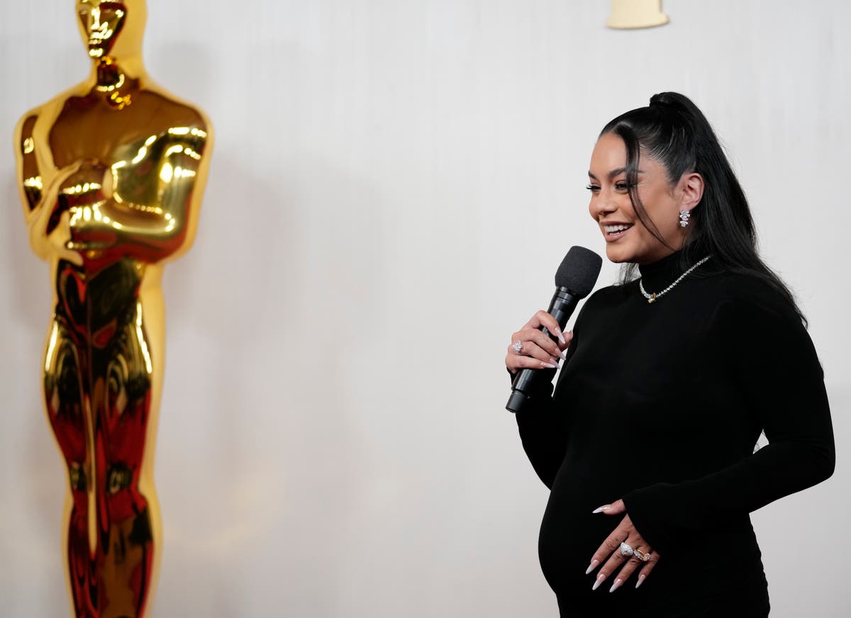 Vanessa Hudgens is pregnant, revealing baby bump at Oscars