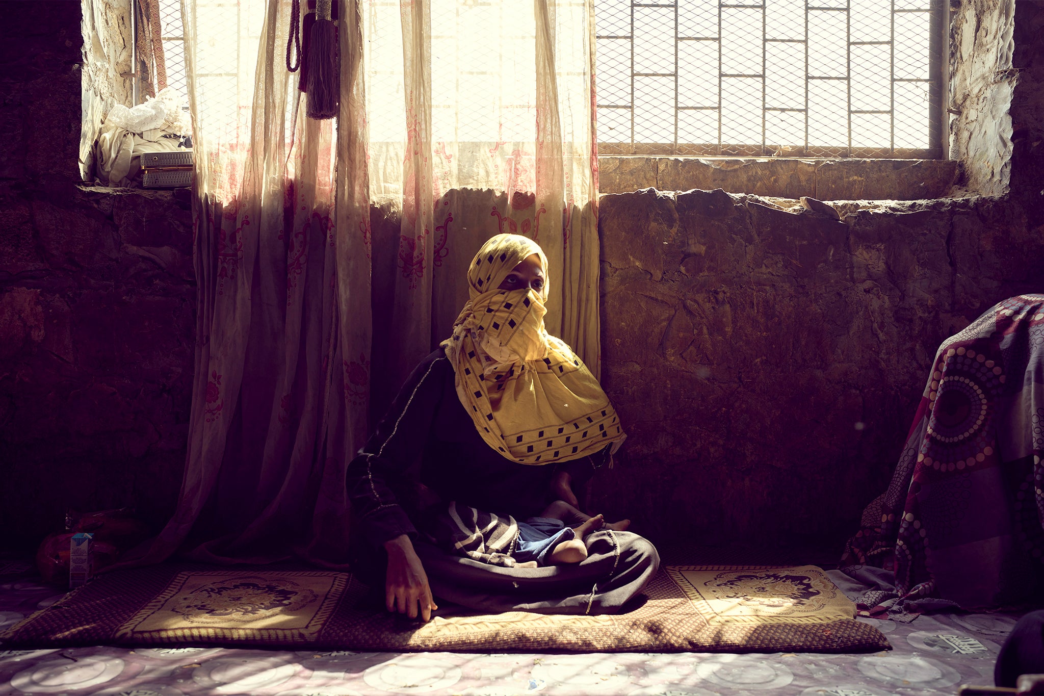 Eshraq, who lost her daughter Elham to malnutrition when she was just eight months old at the Ammar Bin Yasser site