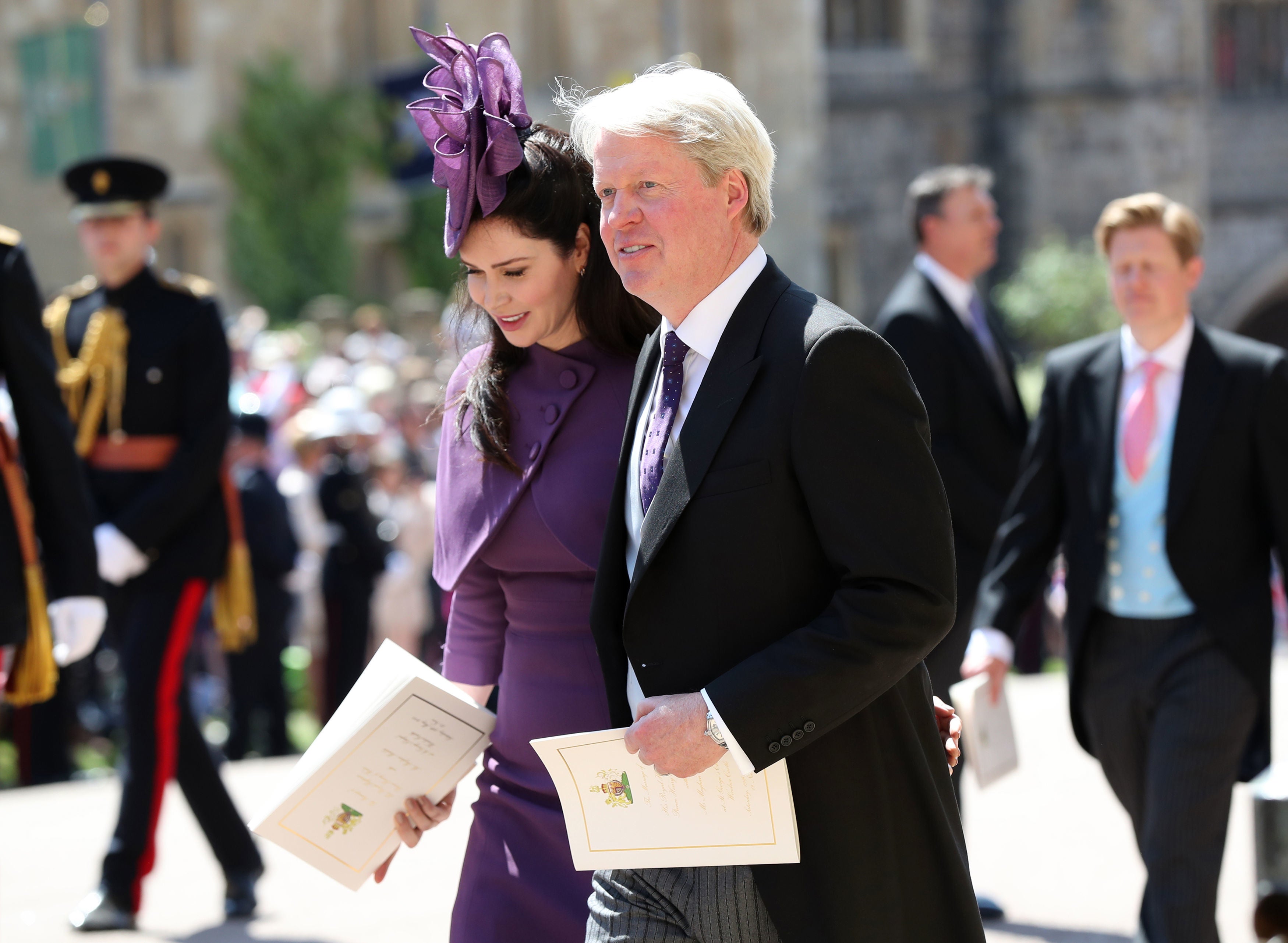 Earl Spencer and Karen Spencer leave St George's Chapel at Windsor Castle after the wedding of Prince Harry to Meghan Markle on May 19, 2018