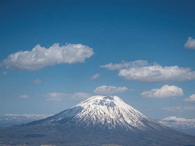 <p>File. Mount Yotei in Japan, as seen from Mount Kombu, Hokkaido prefecture on 6 May 2021 </p>