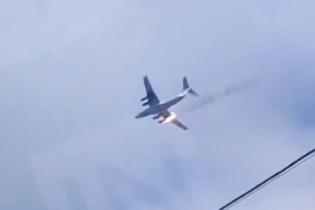 <p>A still from a video puporting to show the plane on fire in the air  </p>