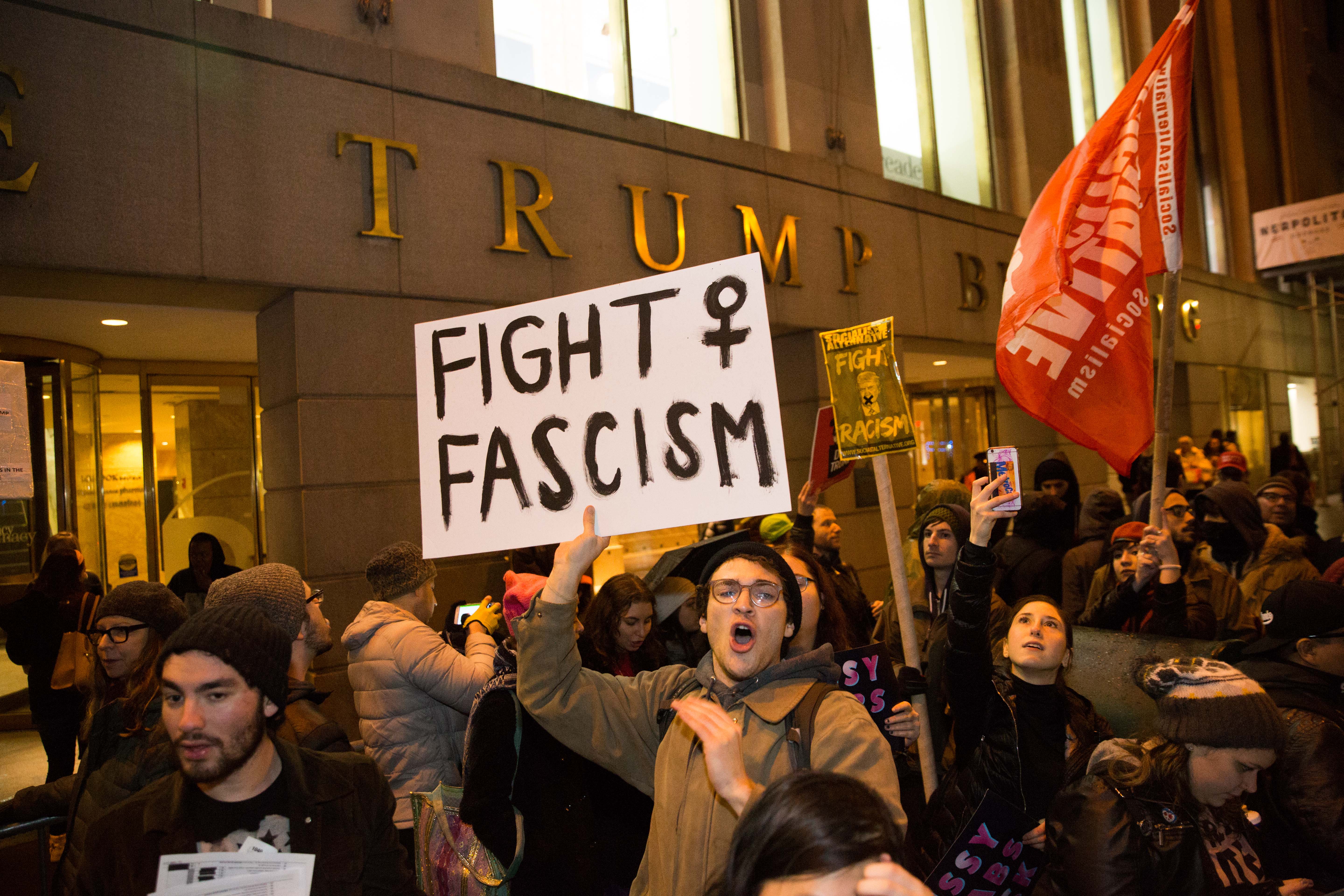 Activists gather in front of the Trump Building during the Stand Against Trump rally and march on 20 January 2017 in New York City