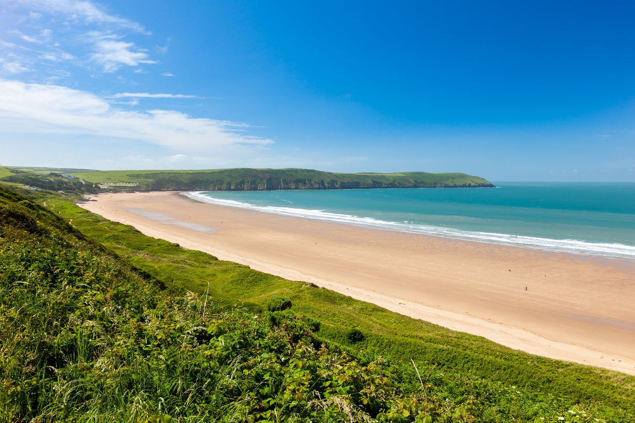 Paddle out on a surf board to enjoy Woolacombe’s waves
