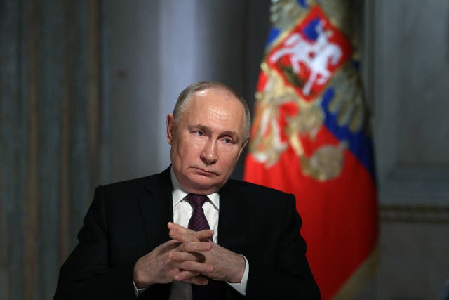 <p>Russian president Vladimir Putin pictured during an interview aired on Wednesday </p>