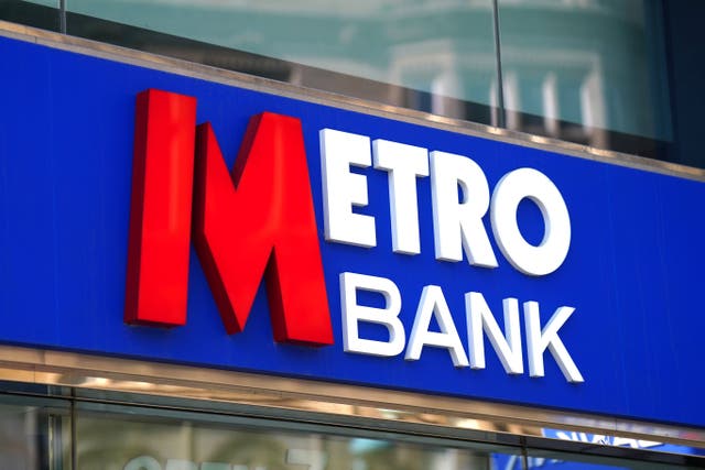 Metro Bank has confirmed it is axing around 1,000 jobs and warned over further staff cuts as part of an overhaul that will also see branches no longer open seven days a week (PA)