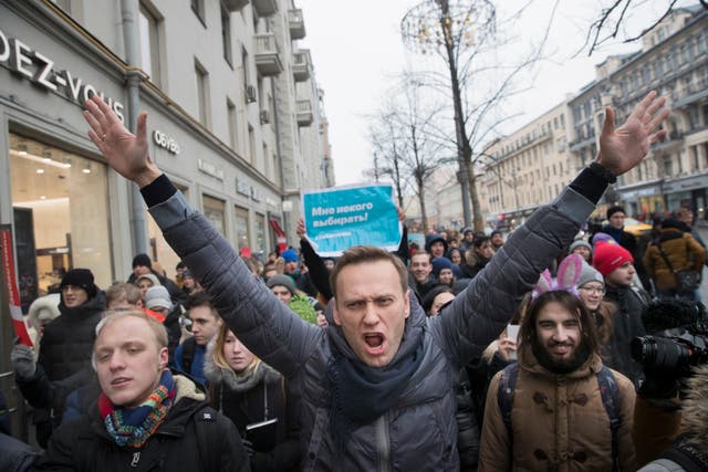 <p>Russian opposition leader Alexei Navalny, center, attends a rally in Moscow on Sunday, Jan. 28, 2018</p>